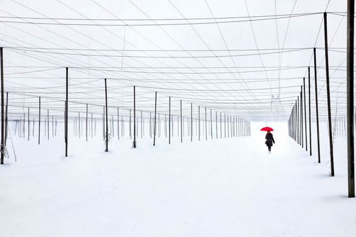 19. Lady with red umbrella
